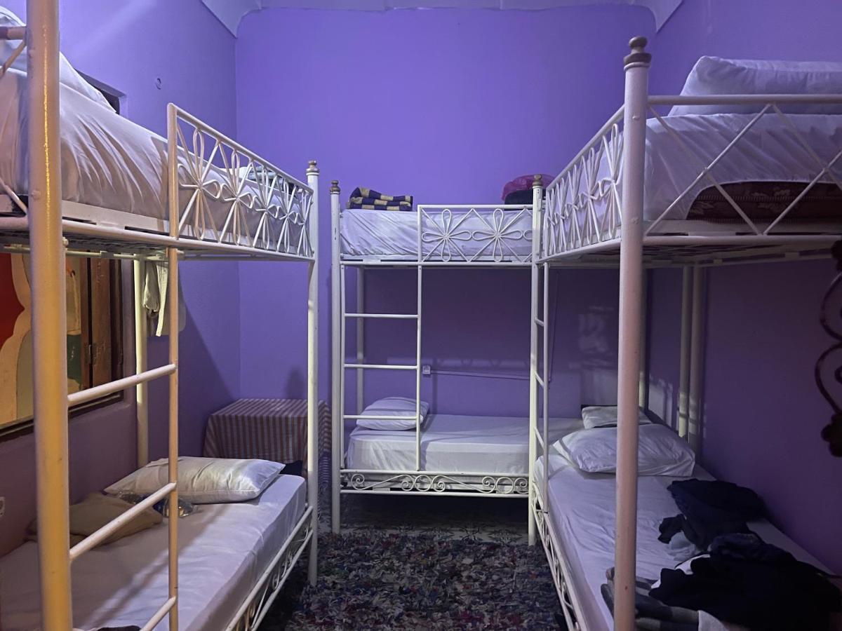 Cama individual en habitación compartida